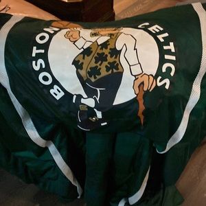 Twin heavy duty Boston Celtics comforter and bed skirt.